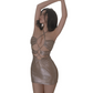 Woman wearing a metallic dress with cut-out design on a white background